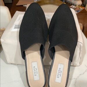 Steven by Steve Madden Women's Black Mules. Stretchy fabric upper.